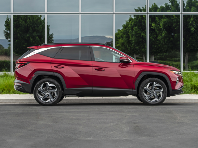 A red Hyundai Tuscon