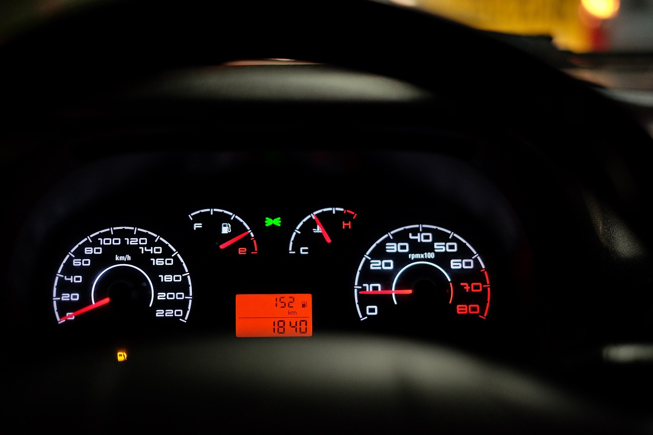 The steering wheel and speedometer of a car
