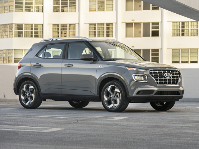 A silver Hyundai Venue parked outside